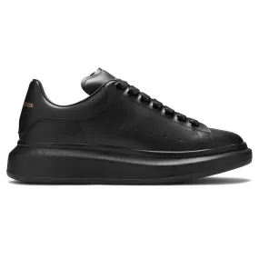 Alexander Mcqueen black sneakers triple raised sole.