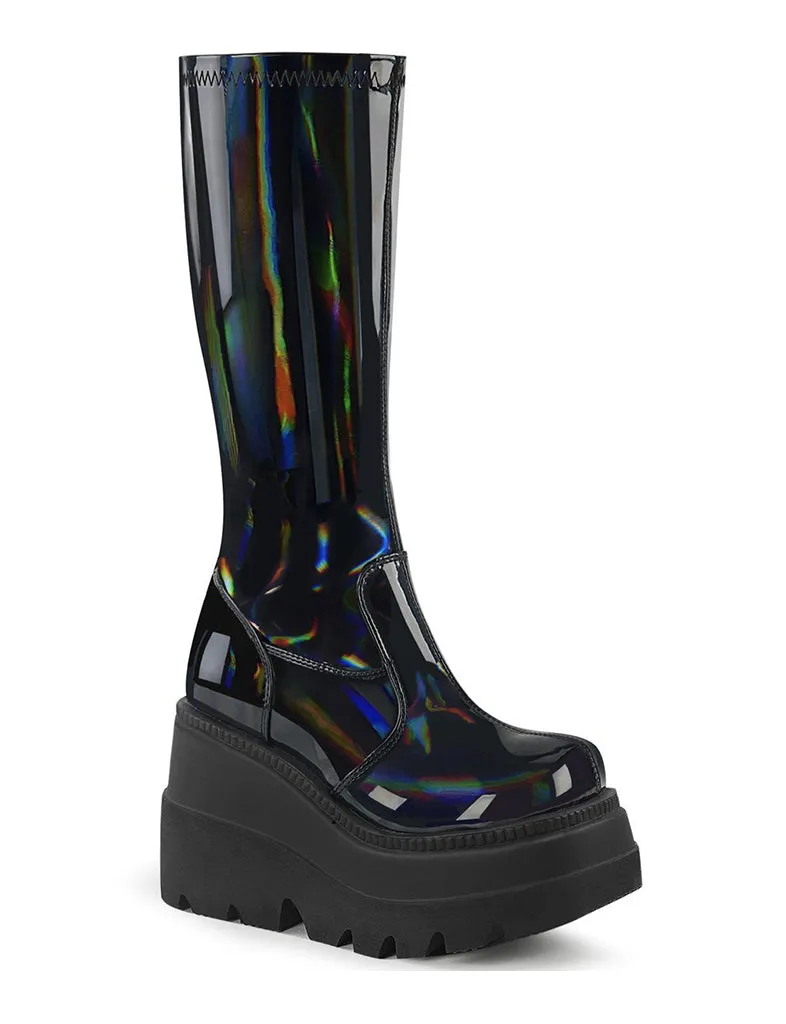 Demonia Shaker 65 Boots | Holo Black Patent | Shop Now