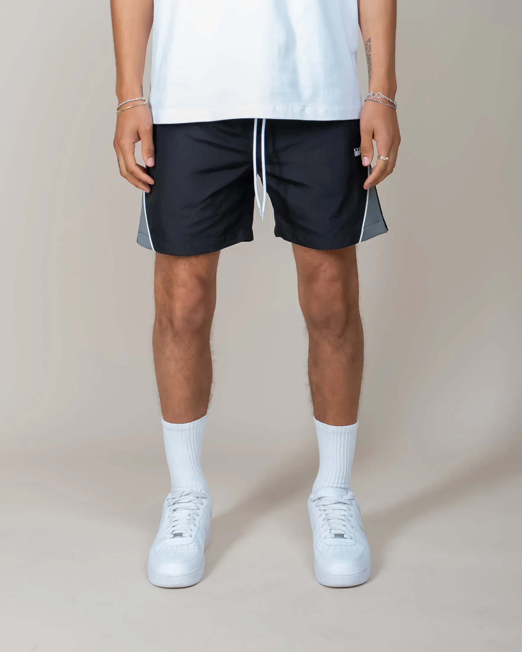 EPTM black derby shorts.