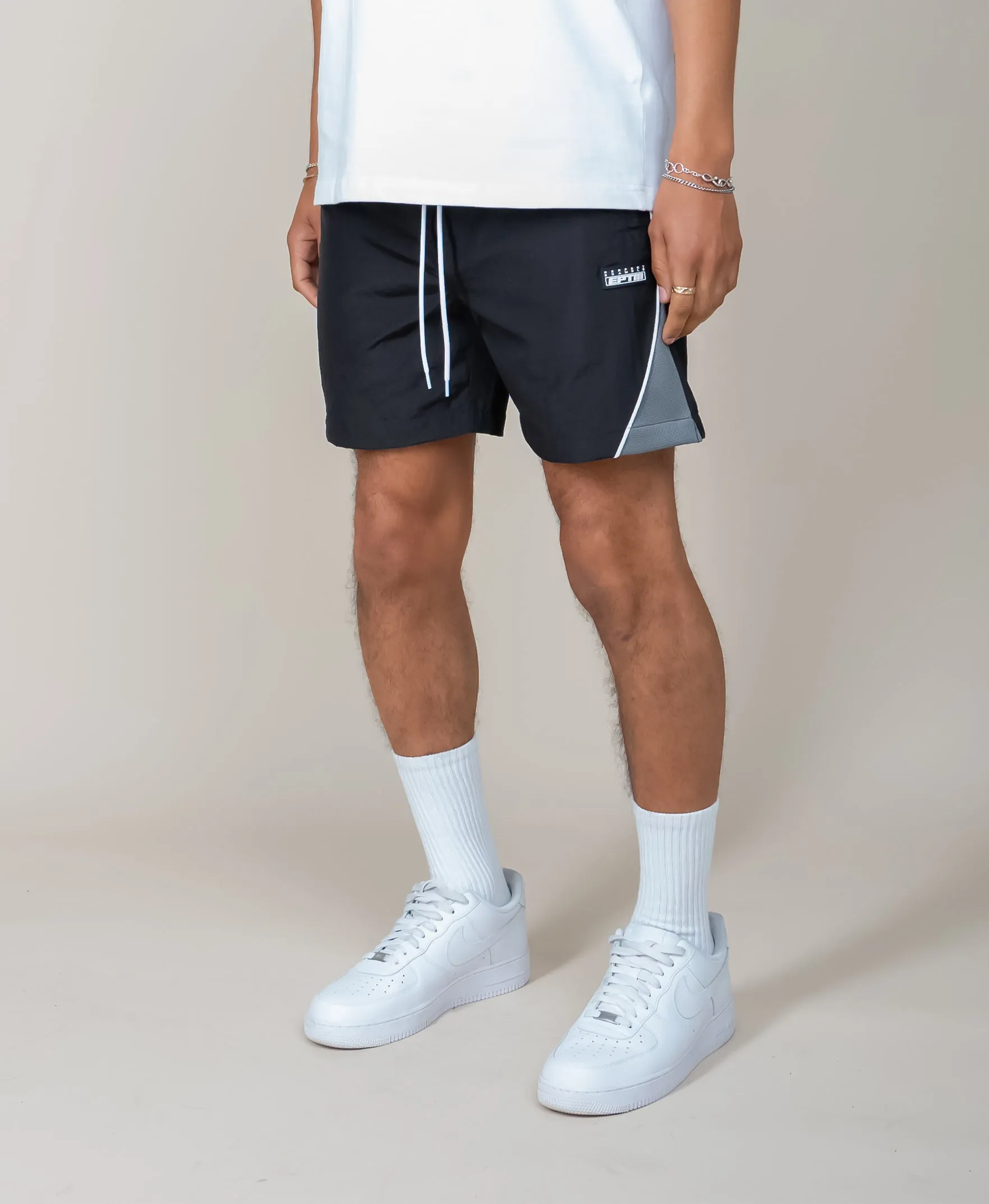 EPTM black derby shorts.