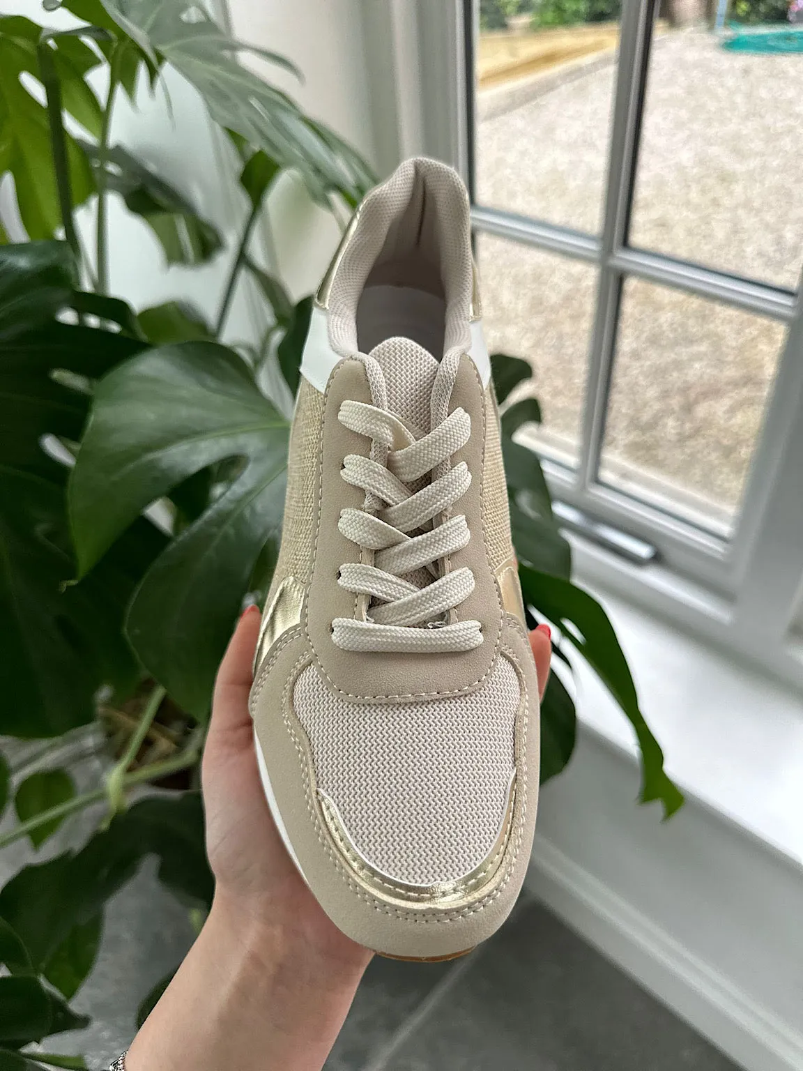 Gold sparkle trainers