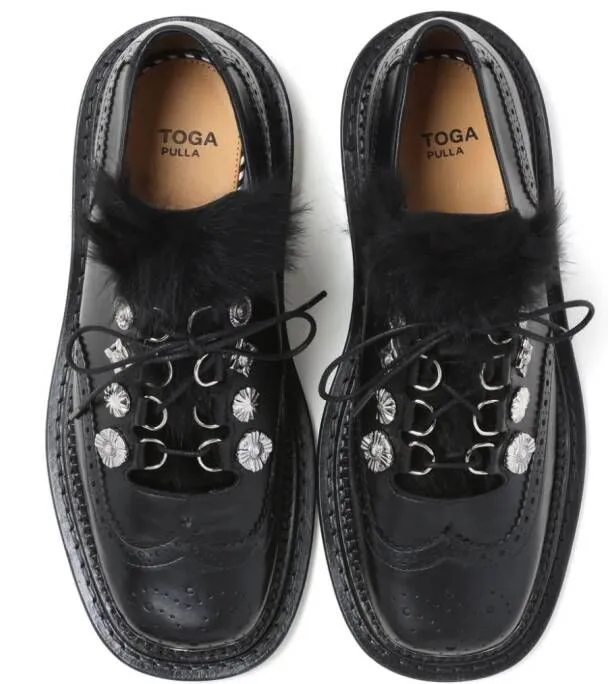 Toga studded leather brogues Black