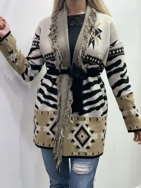 White zebra-print cardigan with fringe.